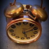 Mechanical alarm clock bell in vintage copper