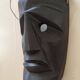 Ethnic ebony wood mask for display or hanging.