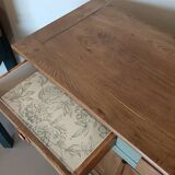 Buffet made of natural wood and bronze green.