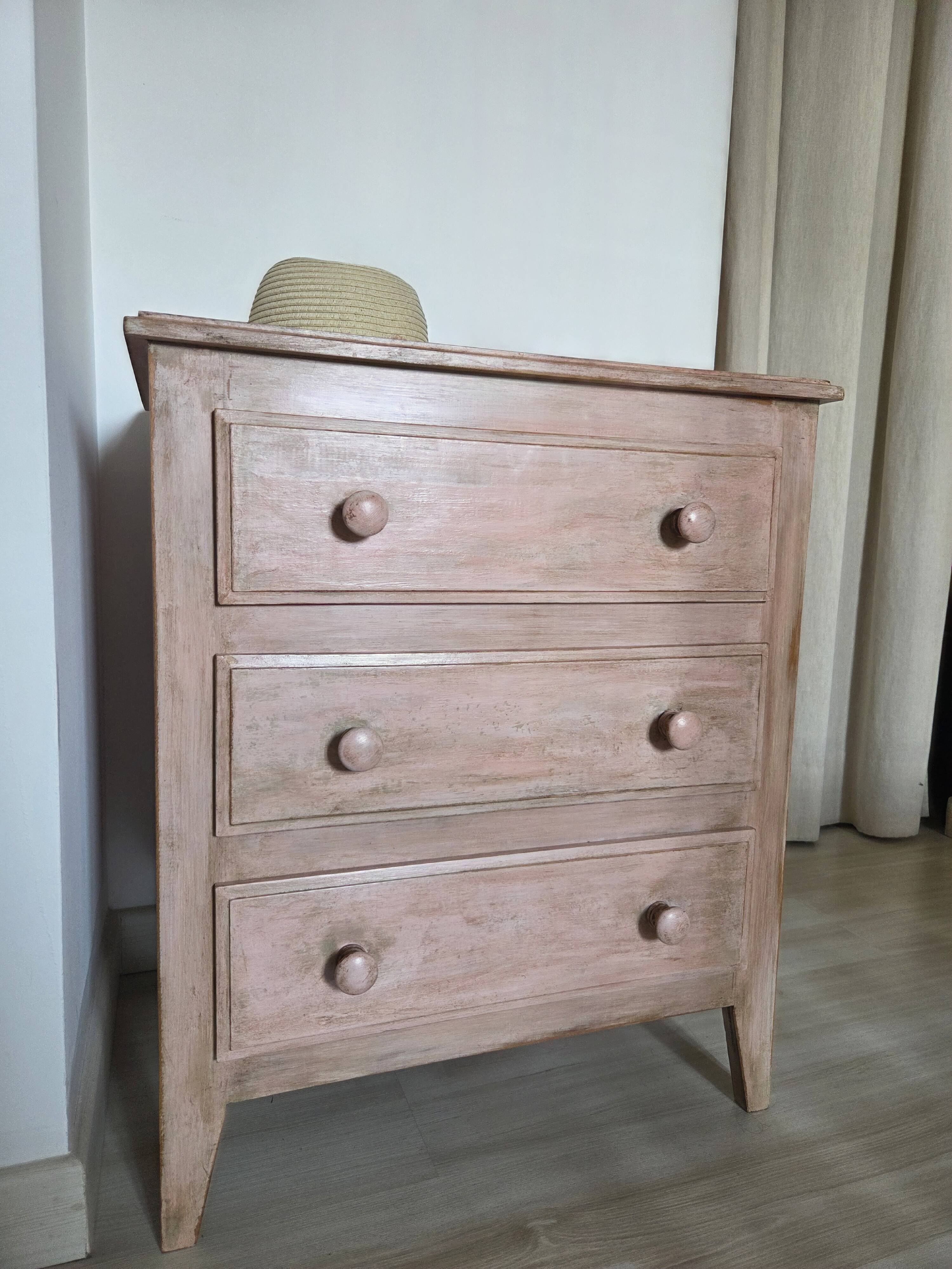 Small Parisian-style chest of drawers patinated in pink.