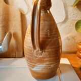 Duo of pitchers water, wine