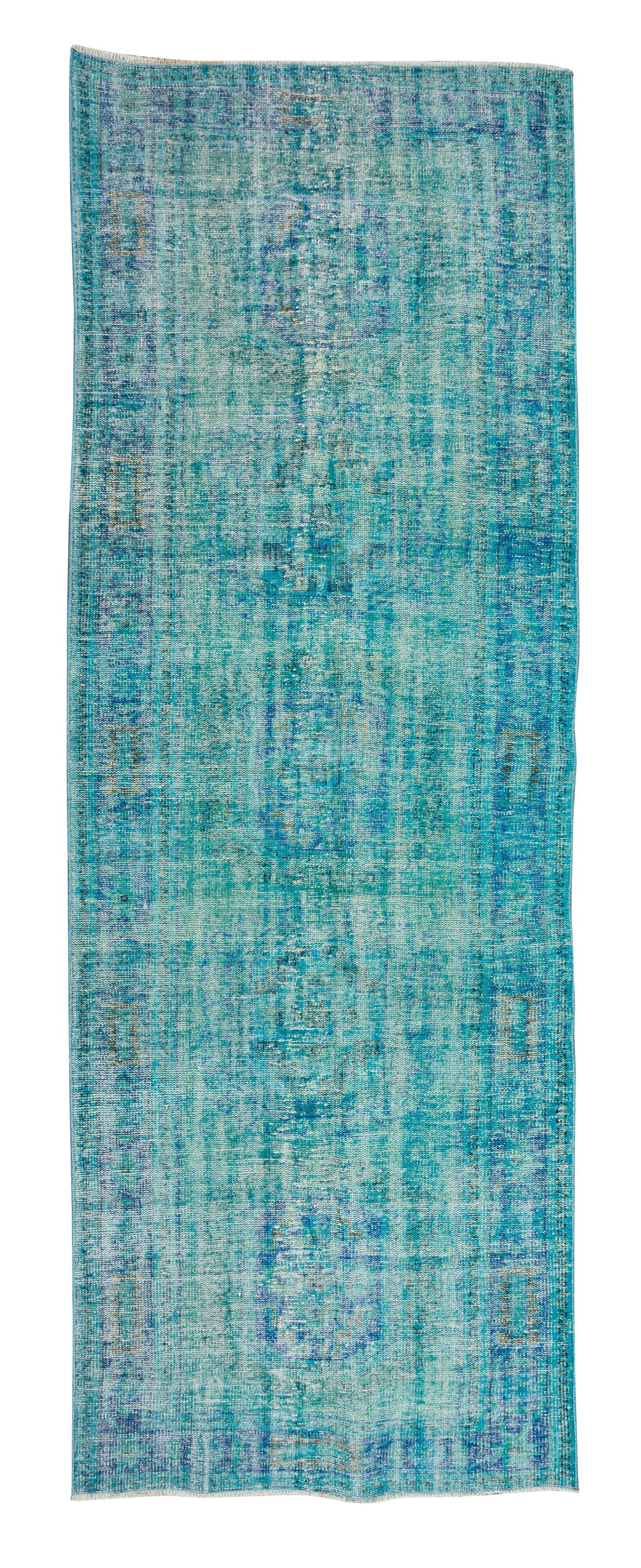 Vintage turkish rug over-dyed in teal blue color