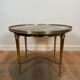 Round coffee table in brass with a marble top from the Ramsay house.