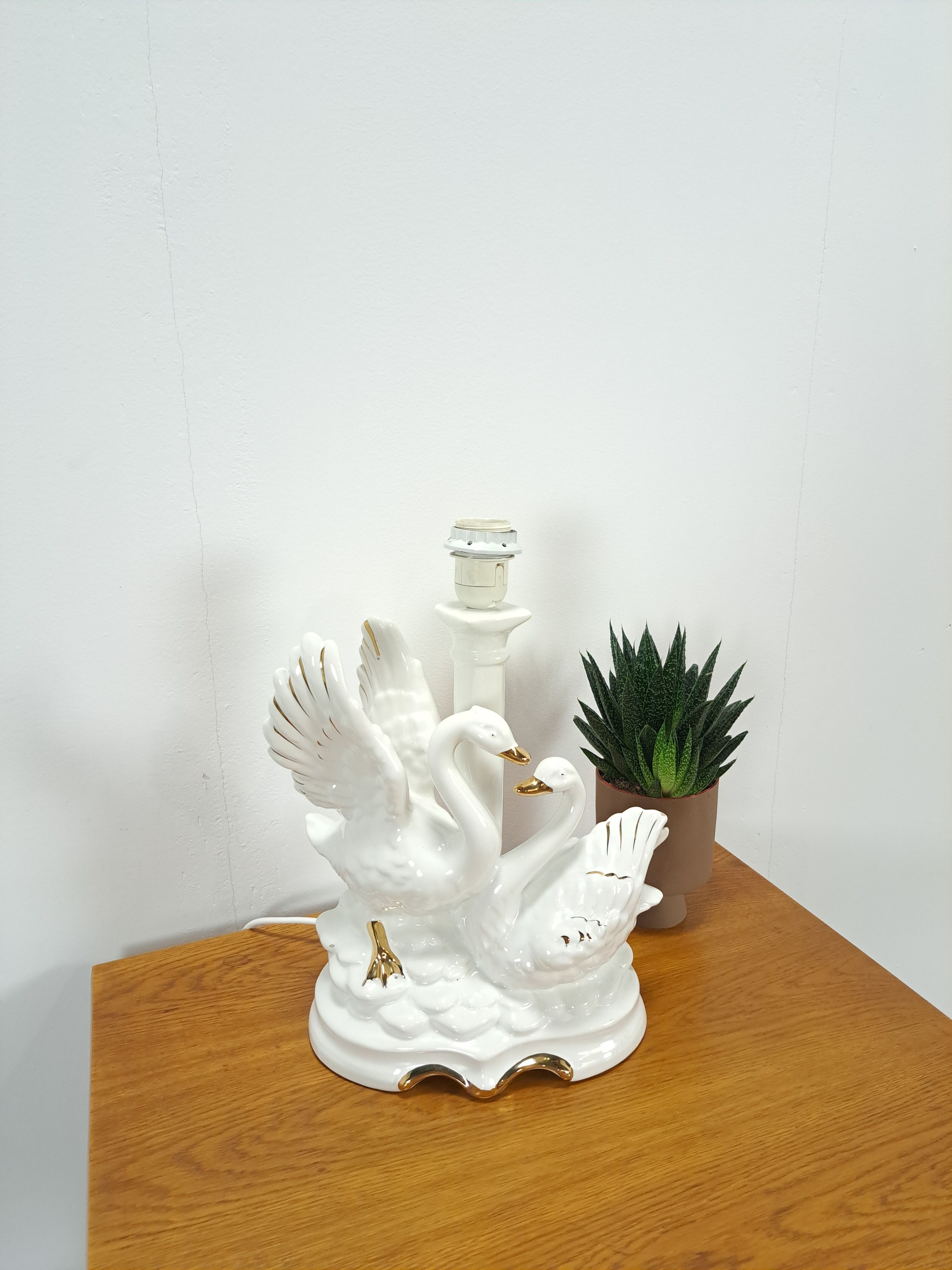 Porcelain lamp swans with vintage gold details