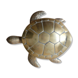 Empty brass turtle pocket