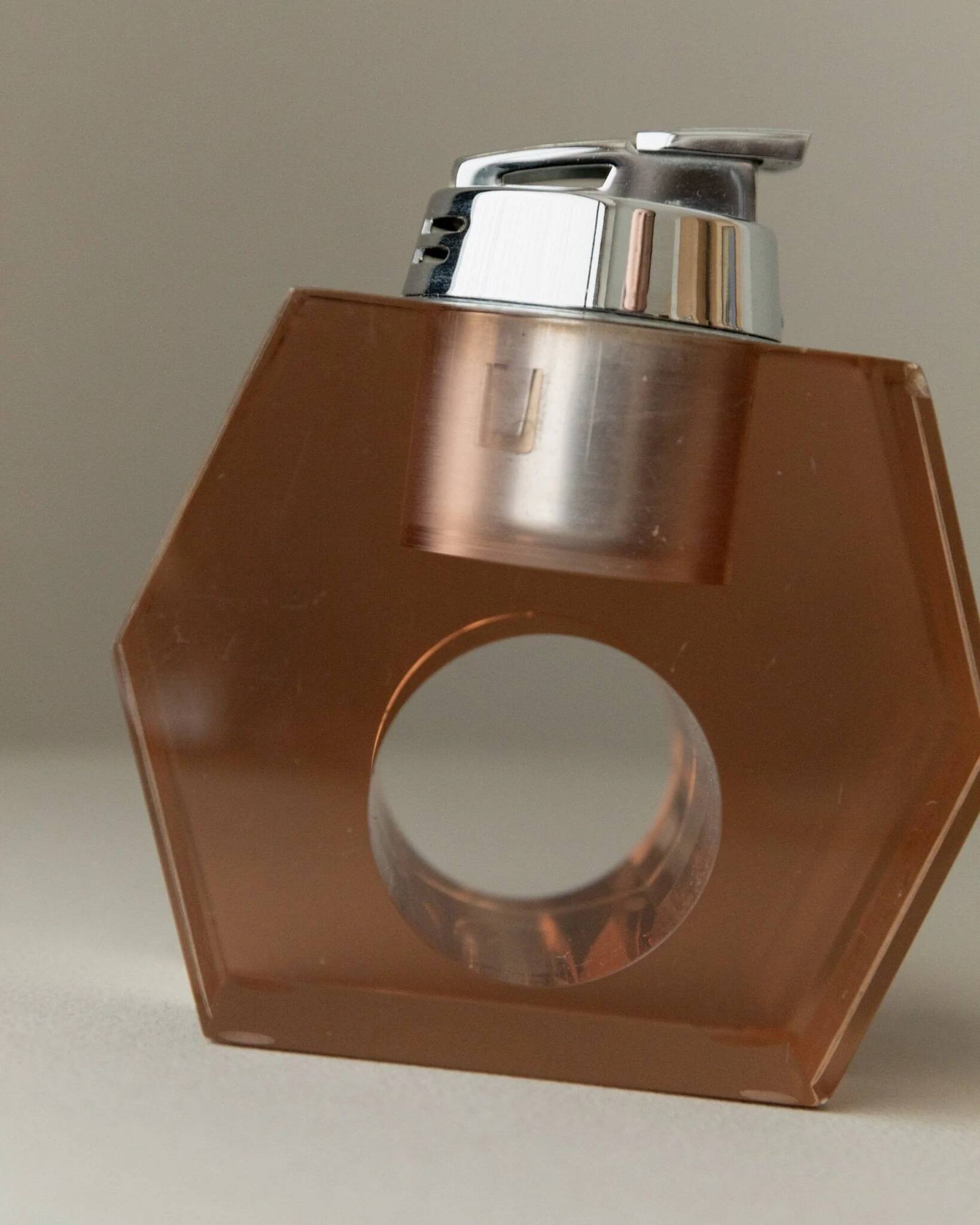 Apricot plexiglass table lighter by Astrolite with silver frame - Space Age Italian 1970s sculpture