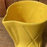 Vintage lemon yellow ceramic pitcher.