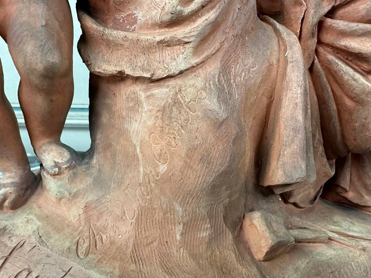 The sculpture, original terracotta signed and dedicated, Charles Van Oemberg.