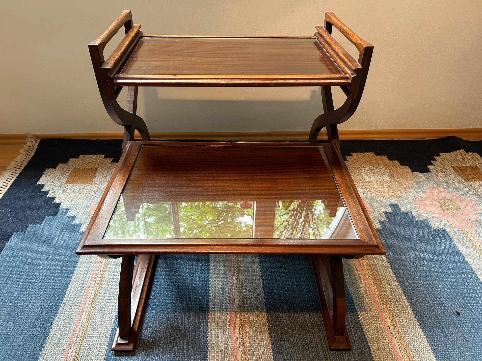 Teak service trolley with nesting table, mid-century modernism.