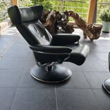 1 Stressless Jazz model armchair - black leather and its ottoman