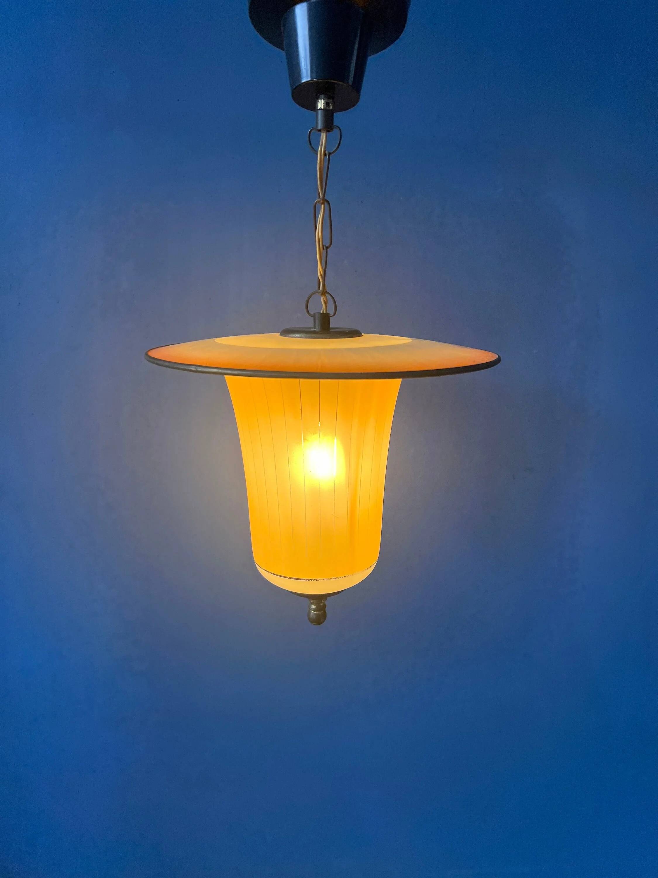 Vintage 1950s glass and brass pendant light.