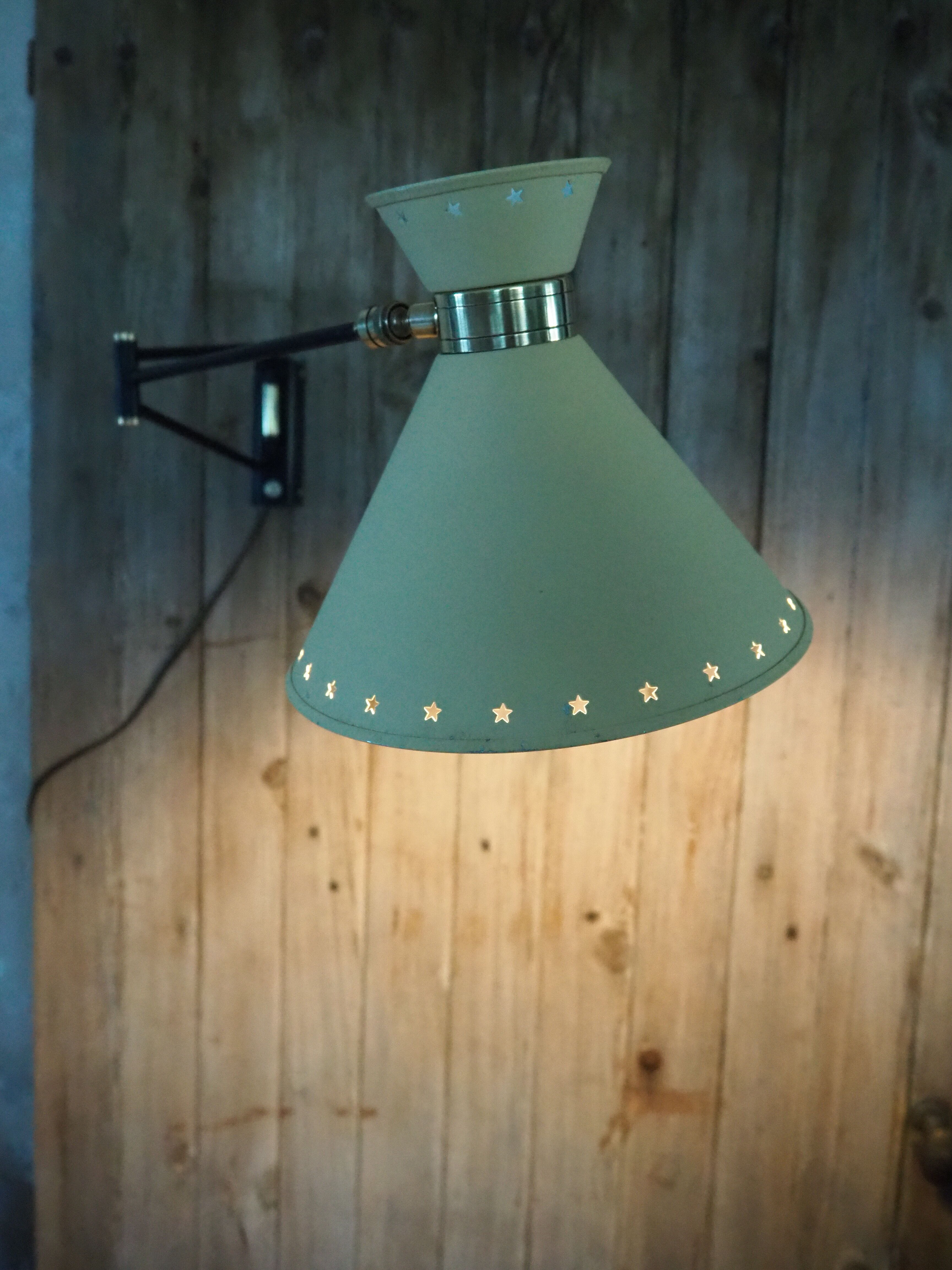 Diabolo articulated wall lamp by designer René Mathieu