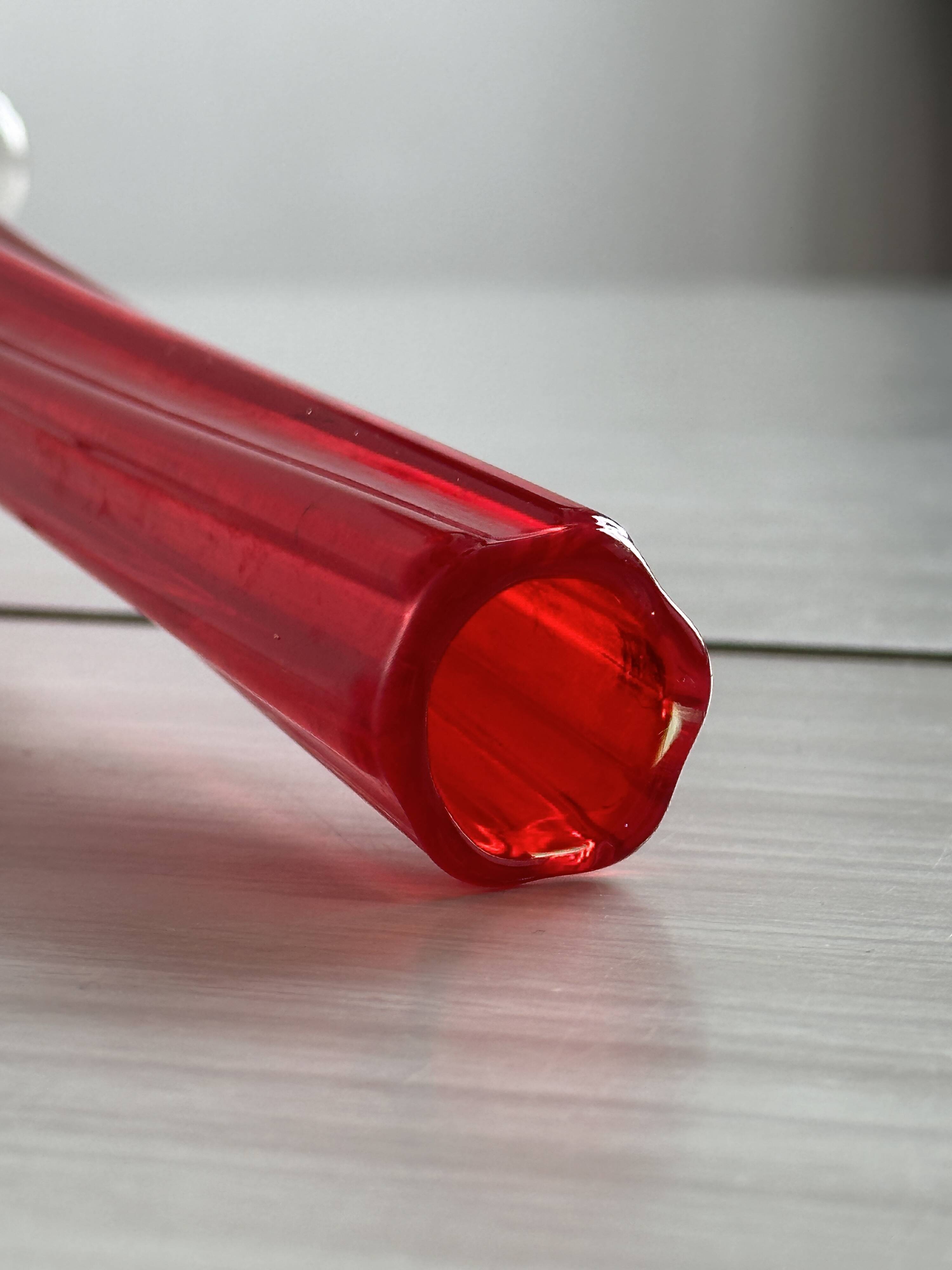 Red glass soliflore vase.