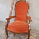 Deux fauteuils type Voltaire, en velours orange