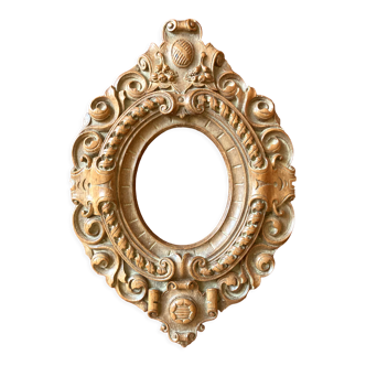 Carved oval wooden frame