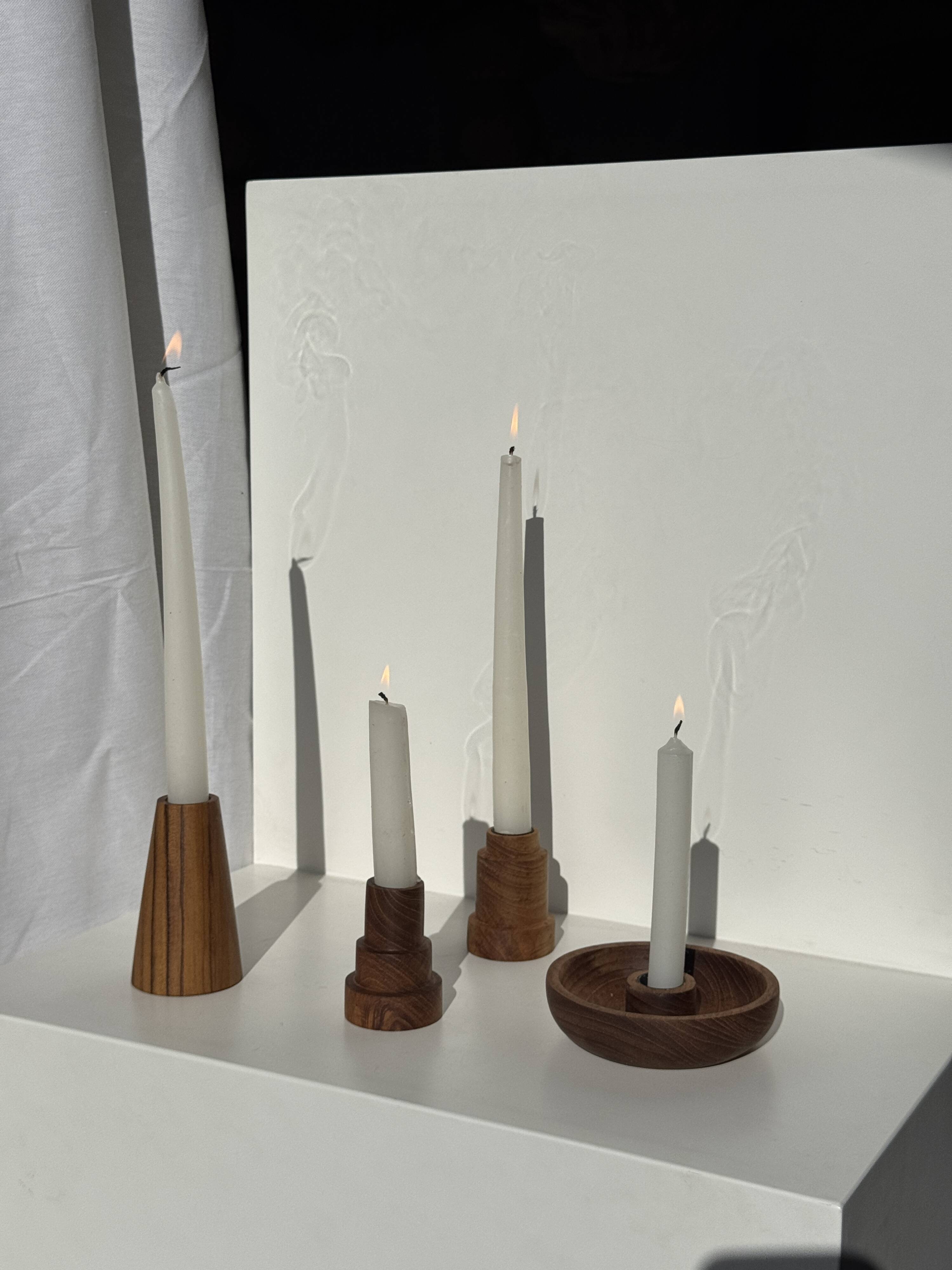 Pyramidal circular teak monoxyle candlestick H7 D5