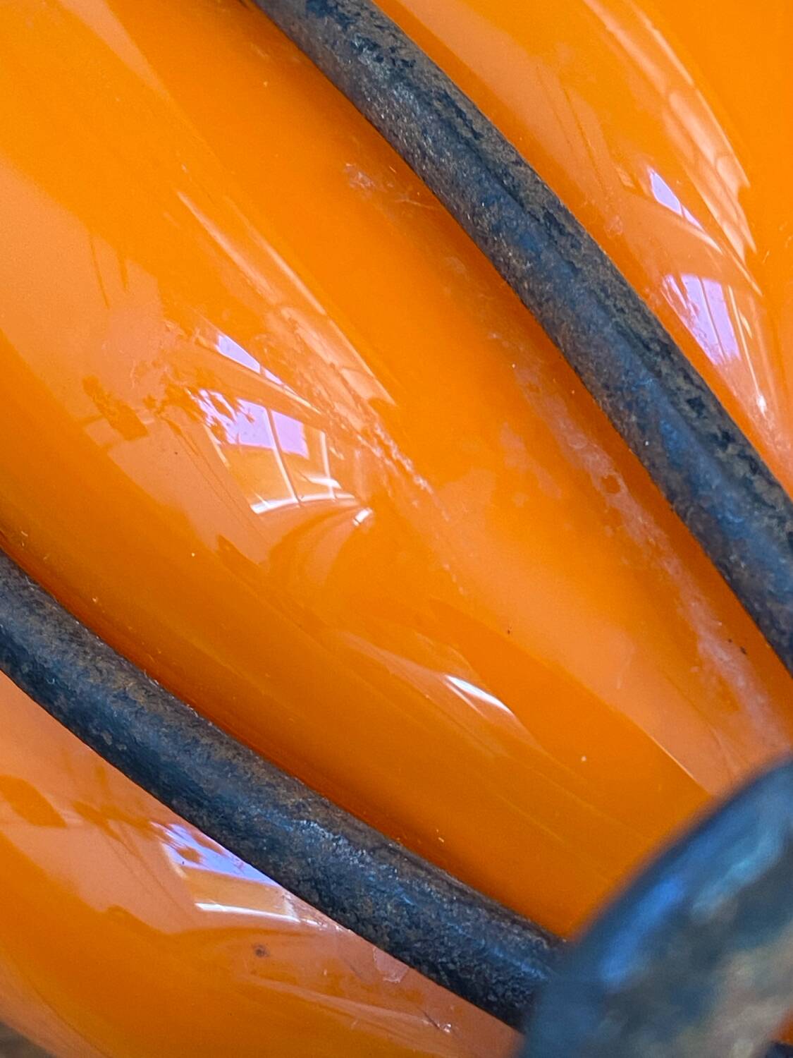 Blown glass vase encased