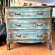 Antique commode with a patina in the Tuscan technique.