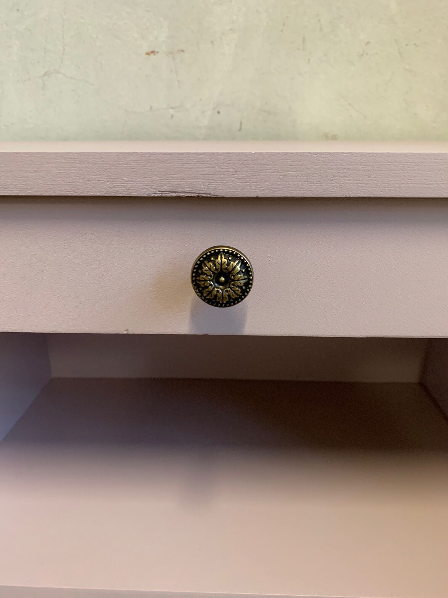 Vintage pale pink bedside table