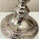 Antique silver-plated candlesticks in classic style
