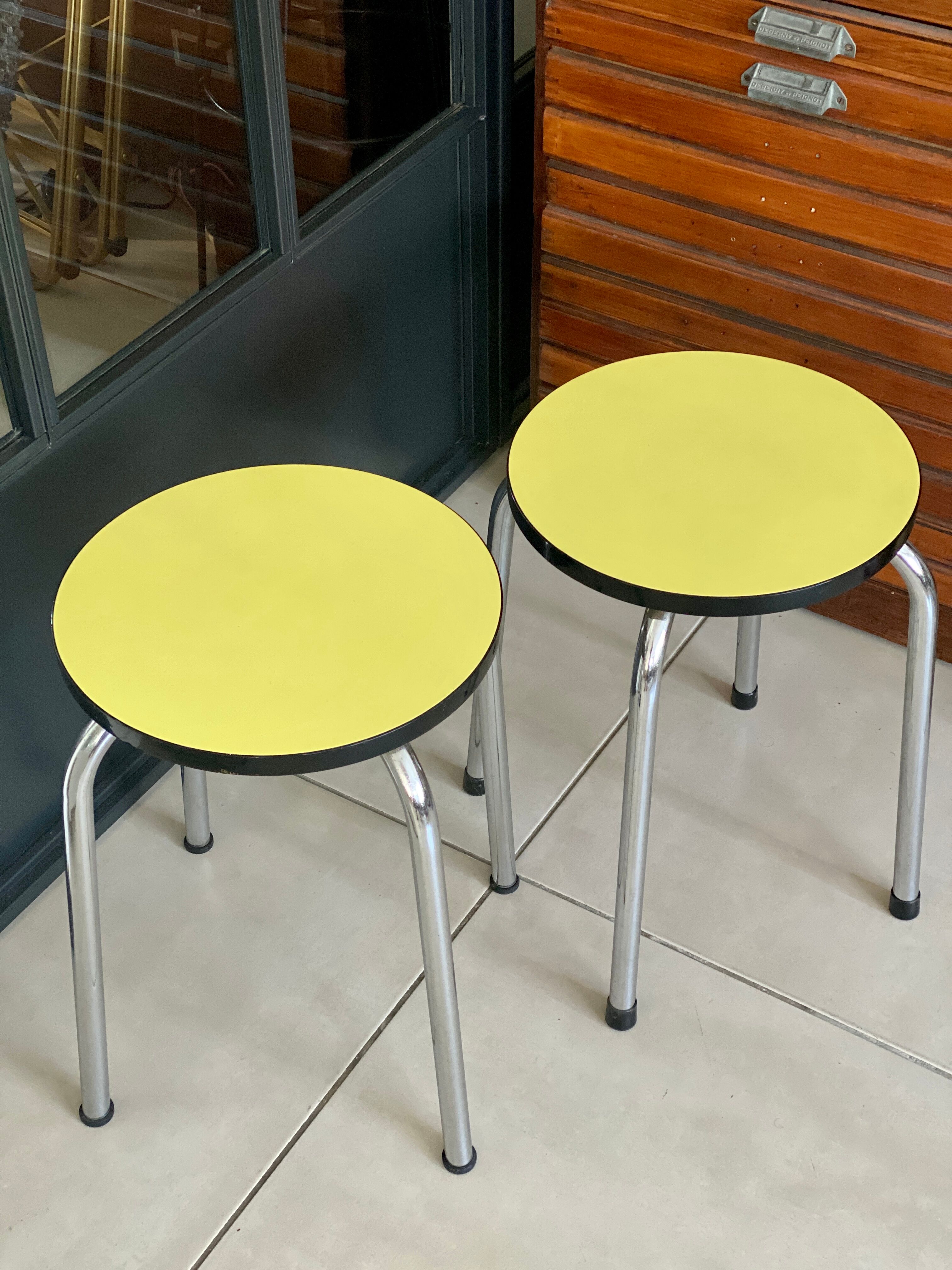Pair of yellow Formica stools