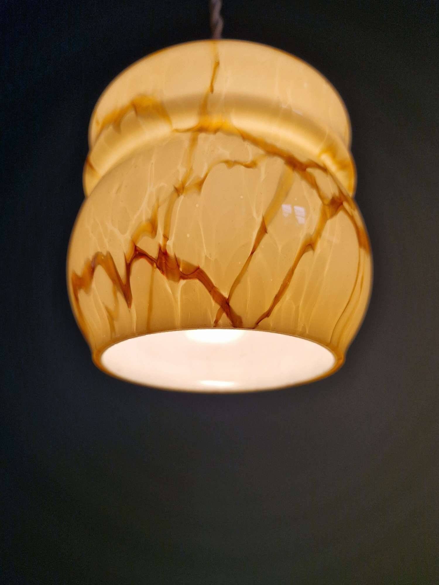 Art Deco trio of suspensions in opaline and marbled ouraline, Scailmont, 1920-30.