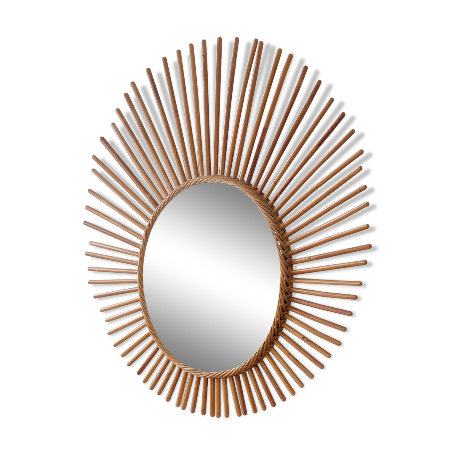 Old large rattan sun mirror