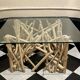 Table basse sculptural bois et verre