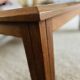 Large handcrafted coffee table in exotic wood + nesting tables.