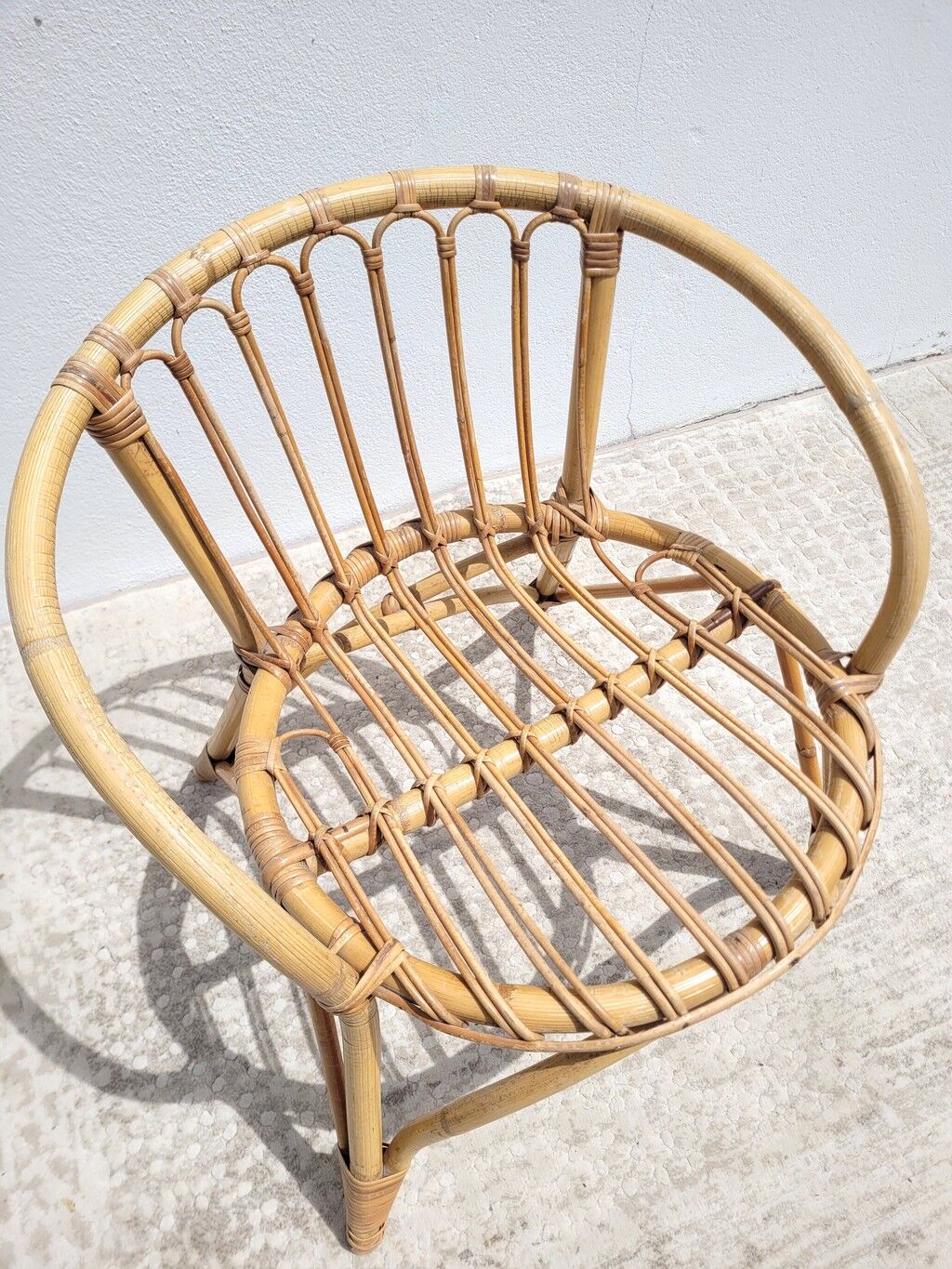 Small vintage rattan children's armchair