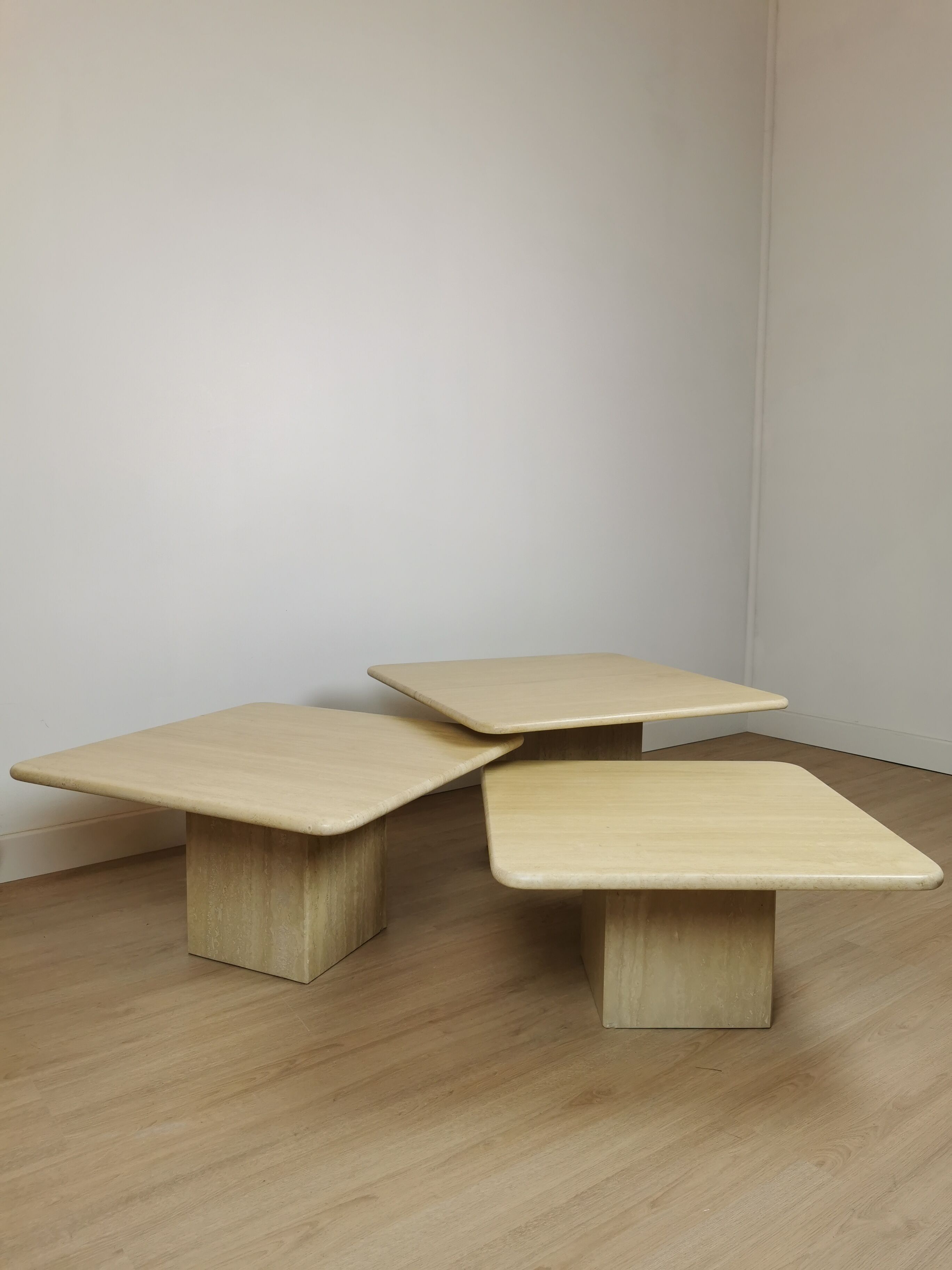 Side tables in travertine 70s