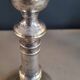 Pair of antique silver-plated brass candlesticks