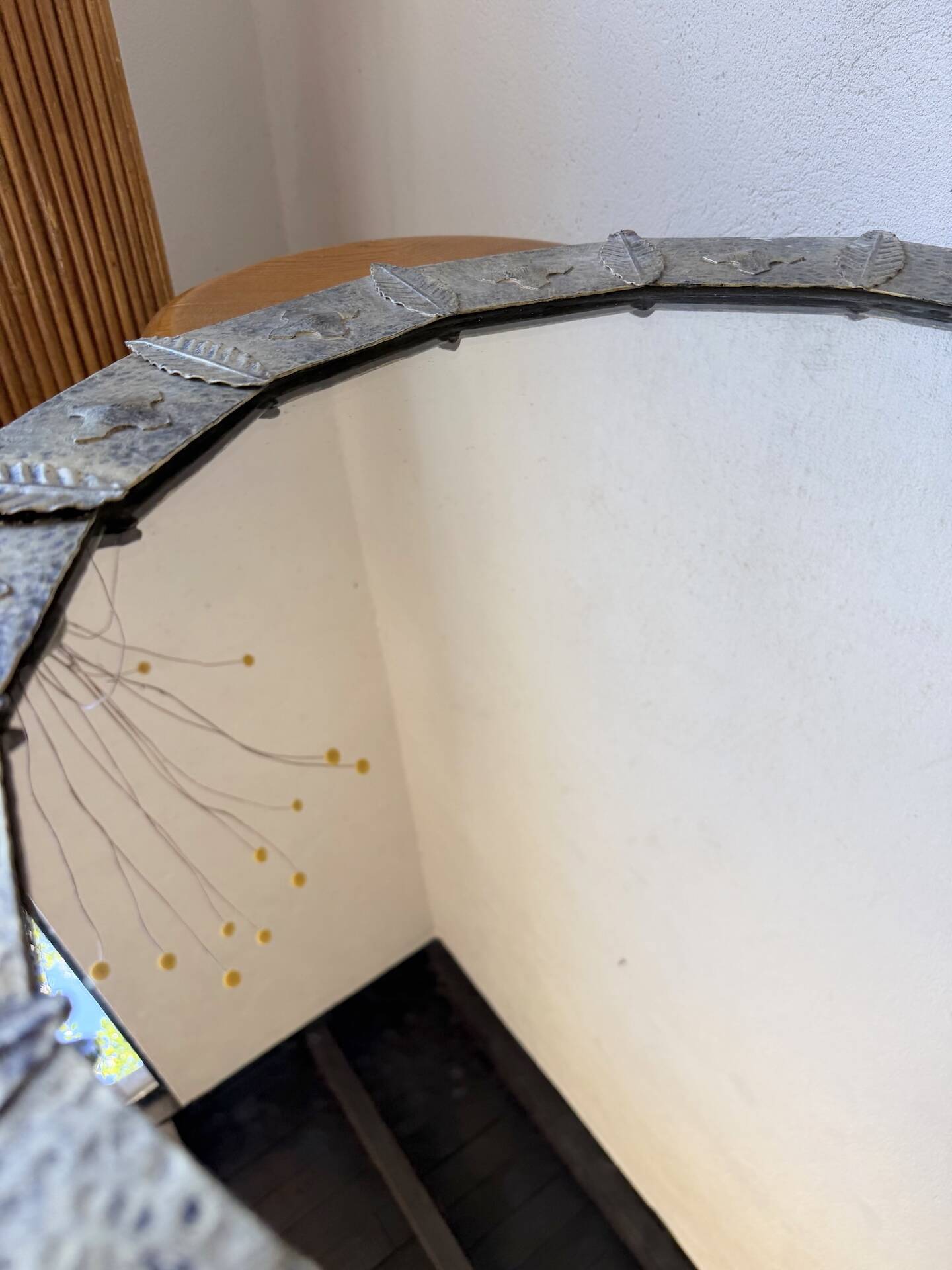 Brutalist round hammered gold metal mirror