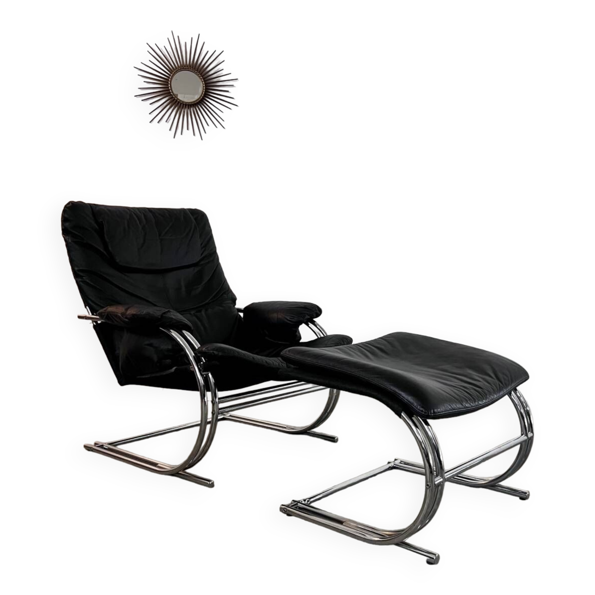 Old armchair and ottoman black leather tubular chrome bauhaus design from the 70s