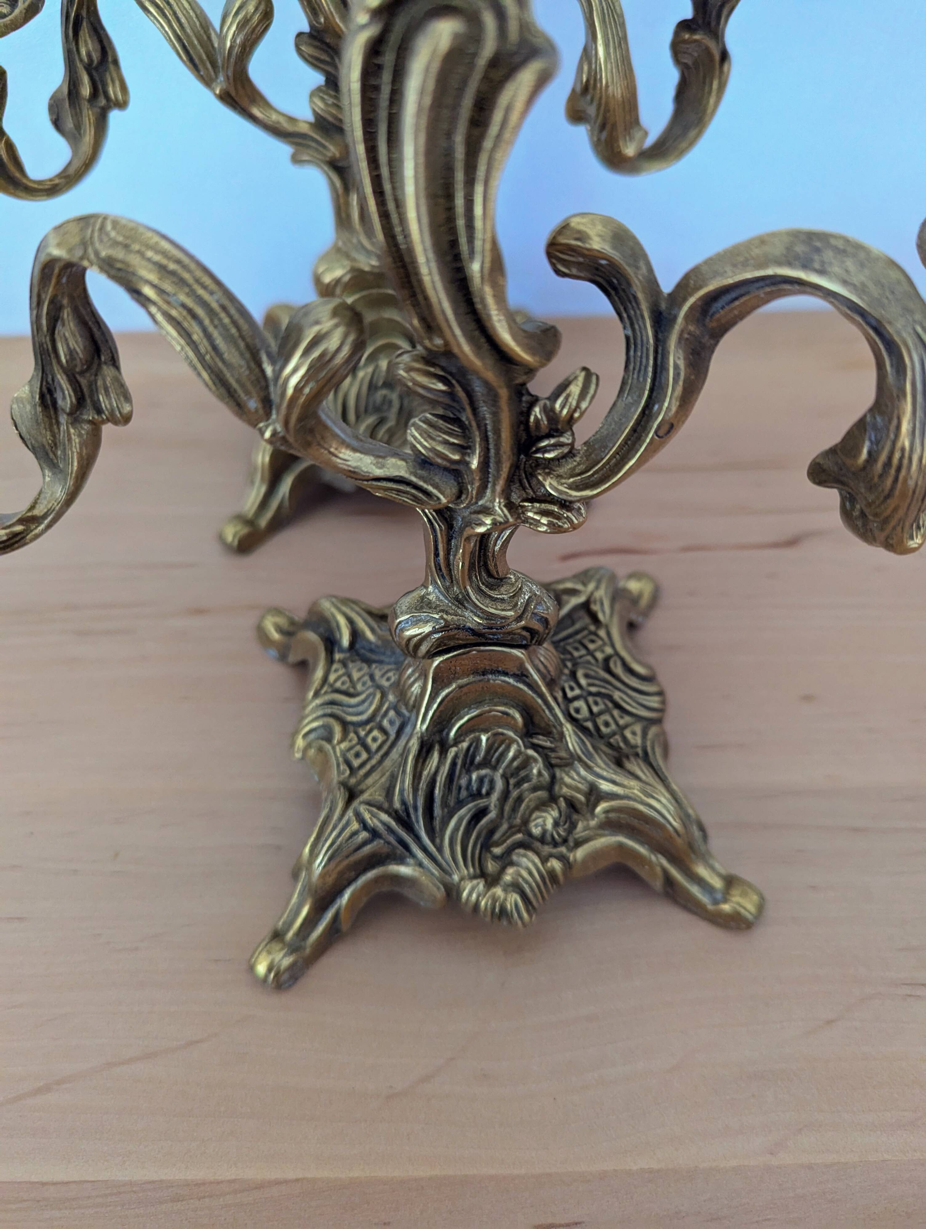 Pair of antique bronze candlesticks in the Louis XV rococo style