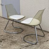 Pair of 70's smoked plexiglass and chrome chairs