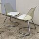 Pair of smoked plexiglass and chrome chairs from the 70s.
