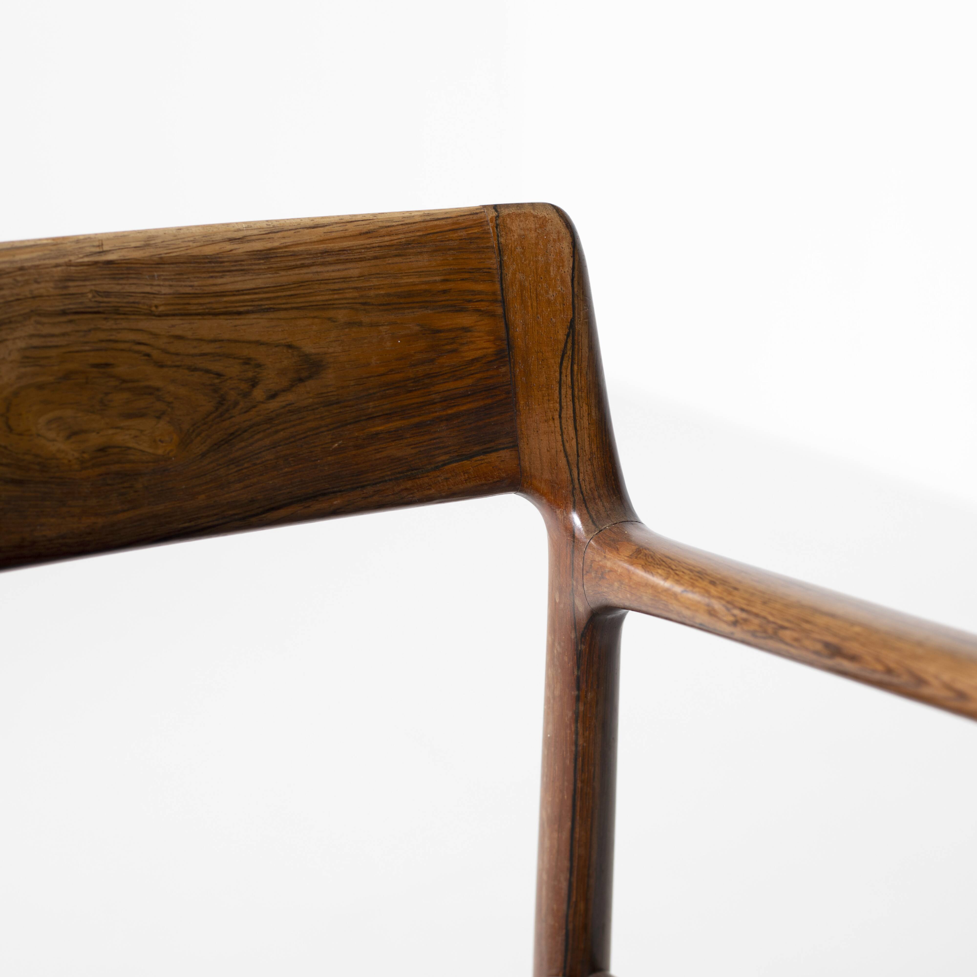 Armchair in rosewood and black leather, by J. Norgaard, Denmark, 1960s