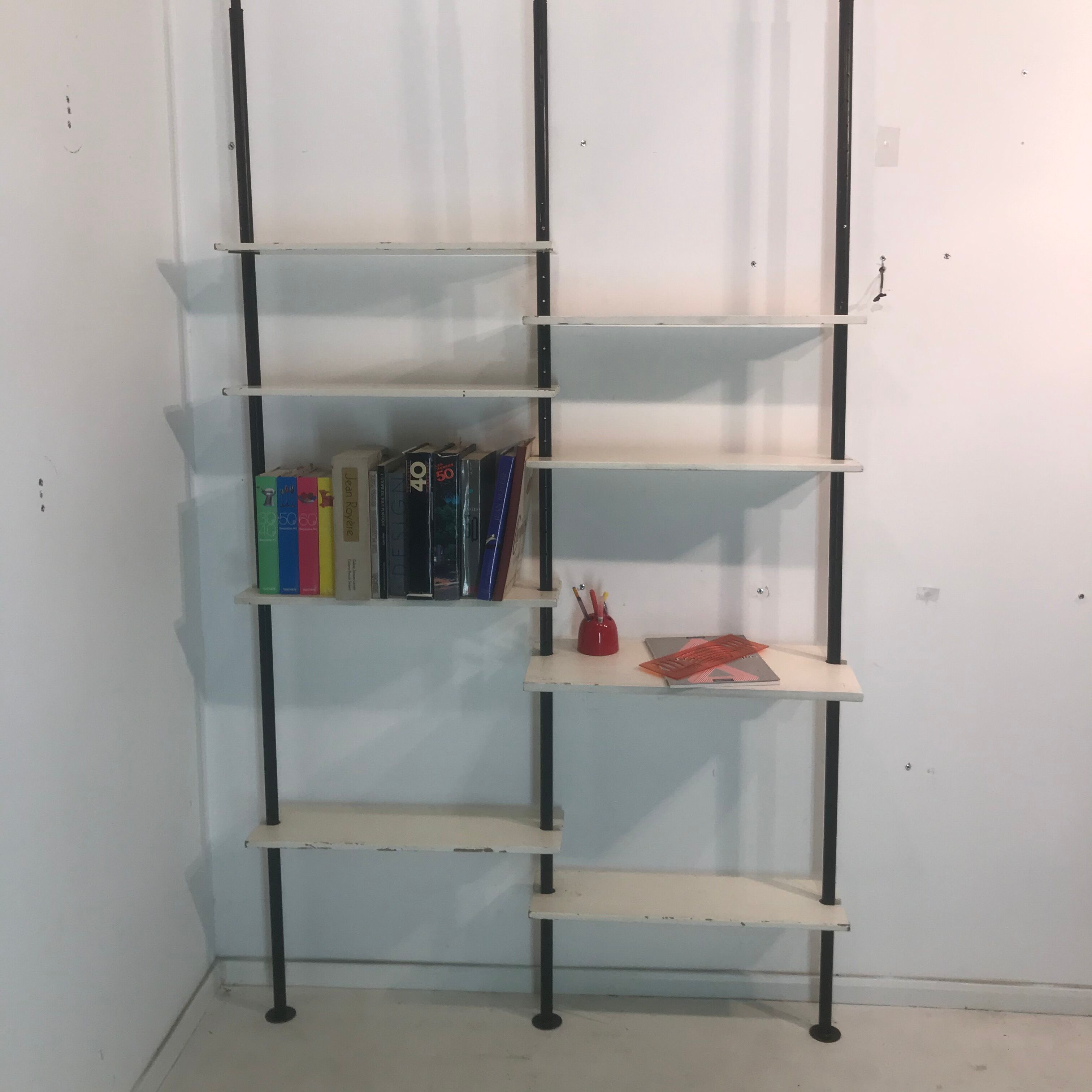 3-mounted floor/ceiling library