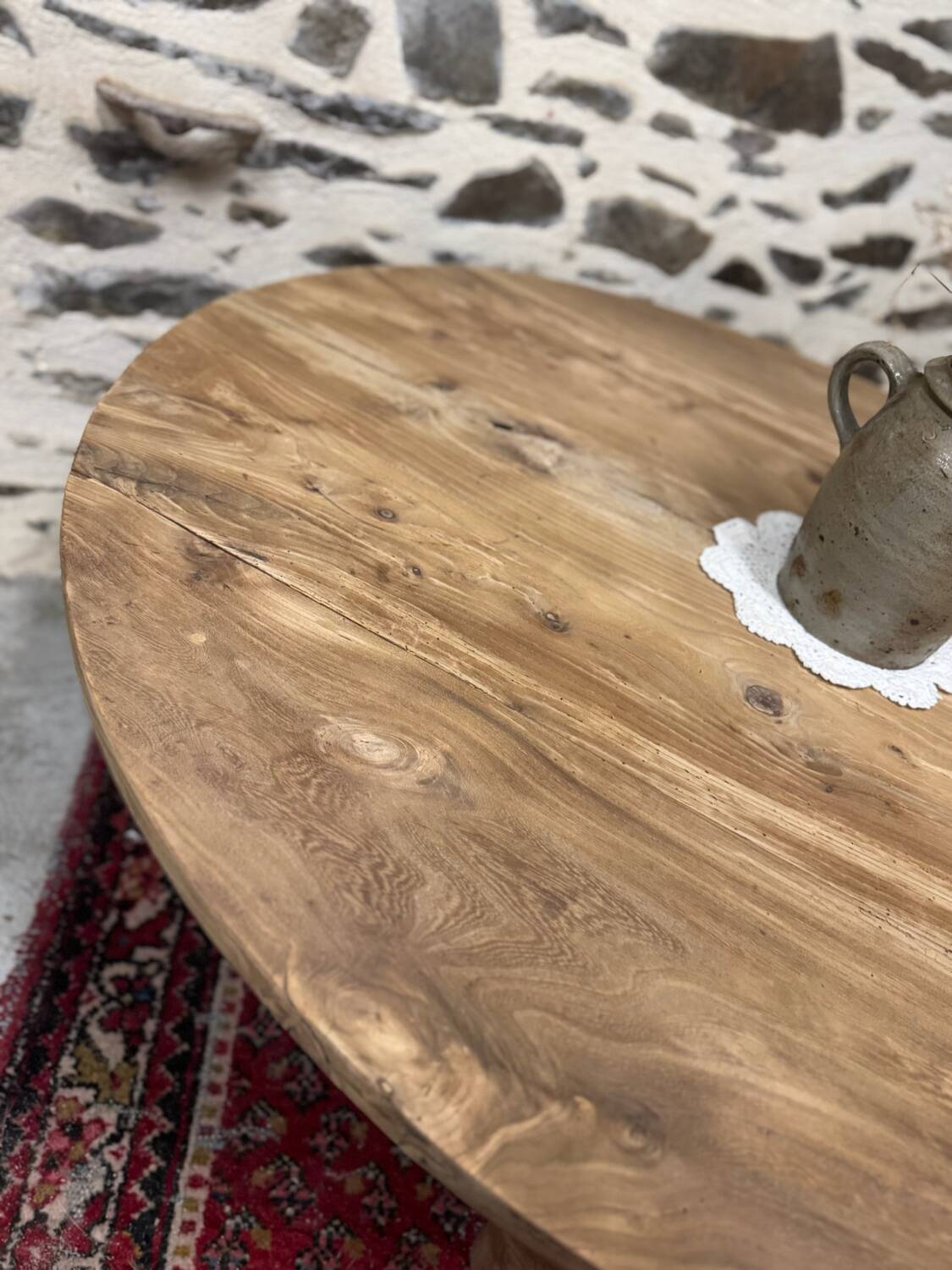 Oval coffee table in raw wood