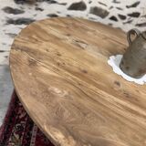 Oval coffee table in raw wood