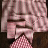 A set of 4 red gingham striped napkins