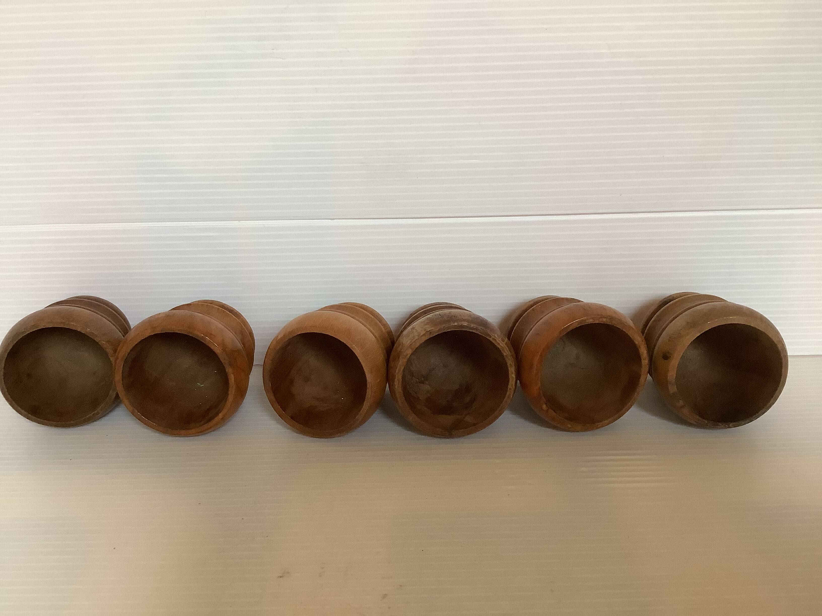 Six olive wood egg cups
