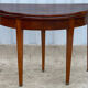 Table demi-lune en placage d'acajou