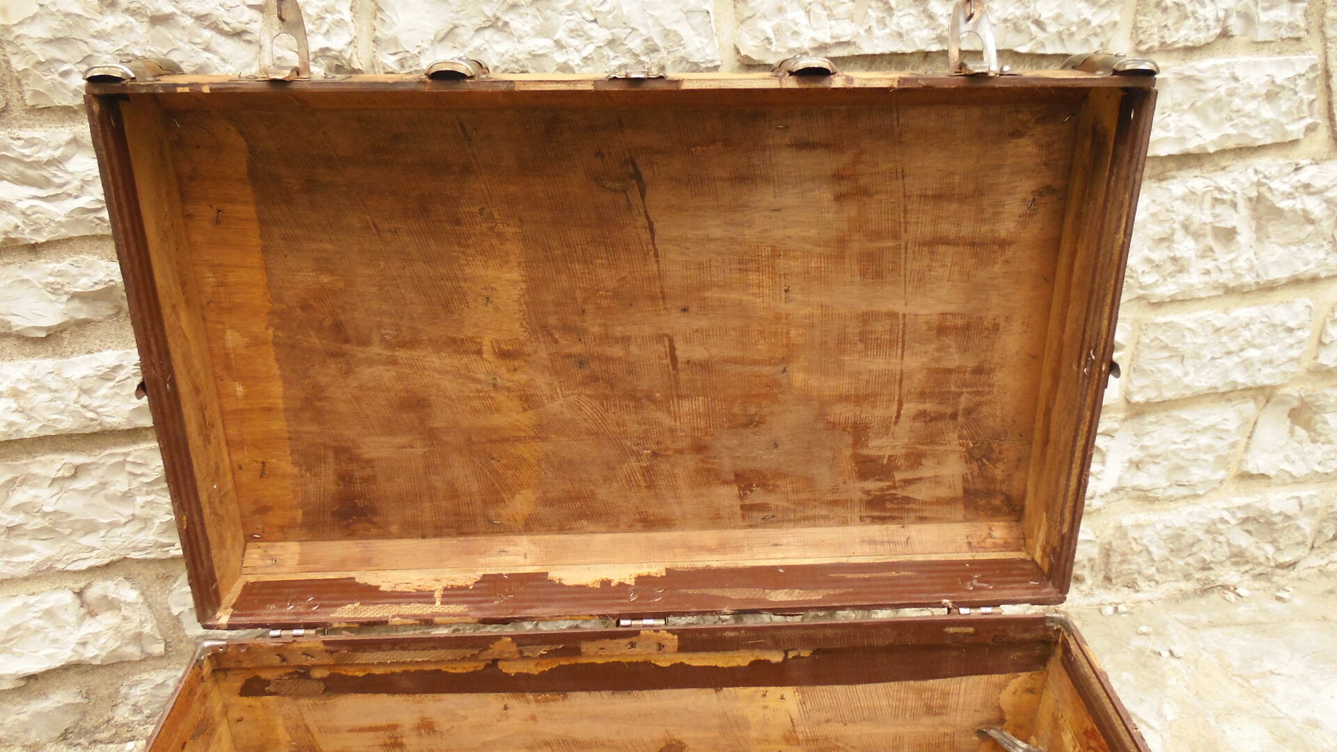 Former large wooden and iron trunk