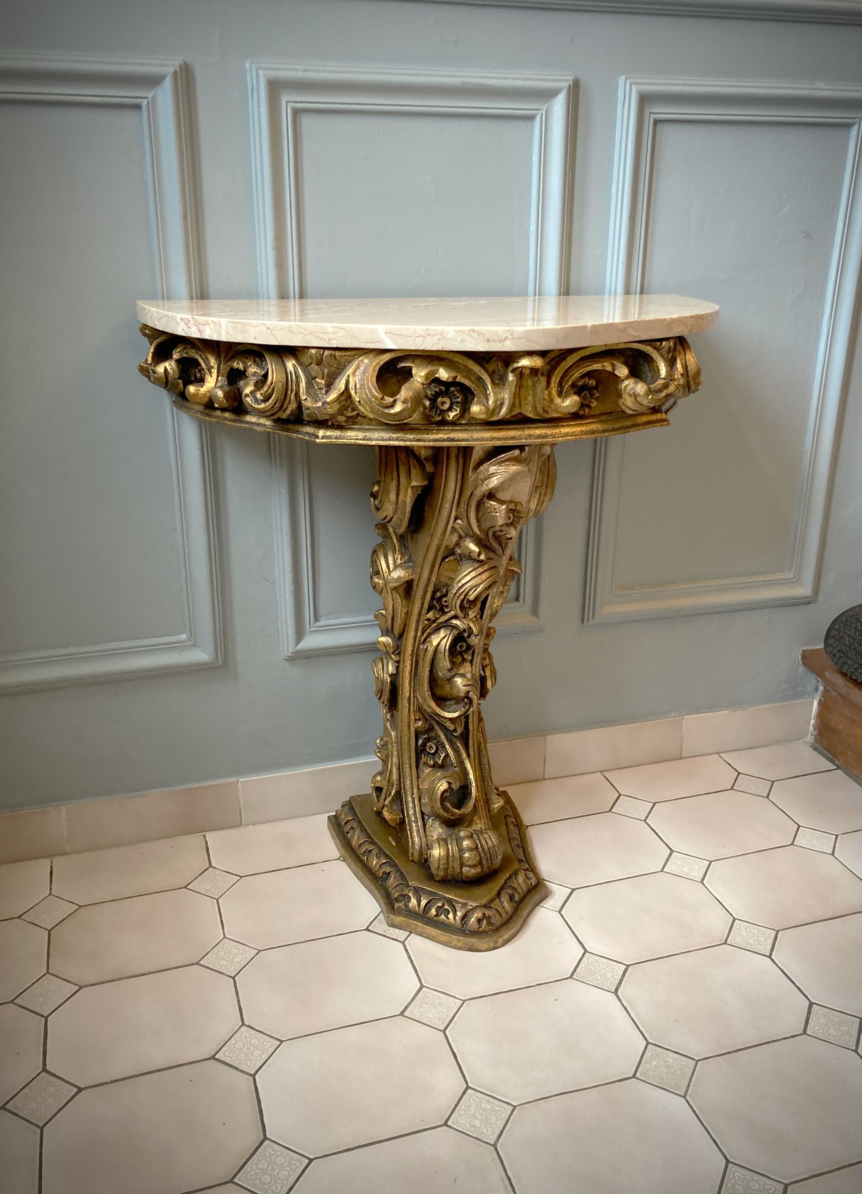 Carved wooden and marble console