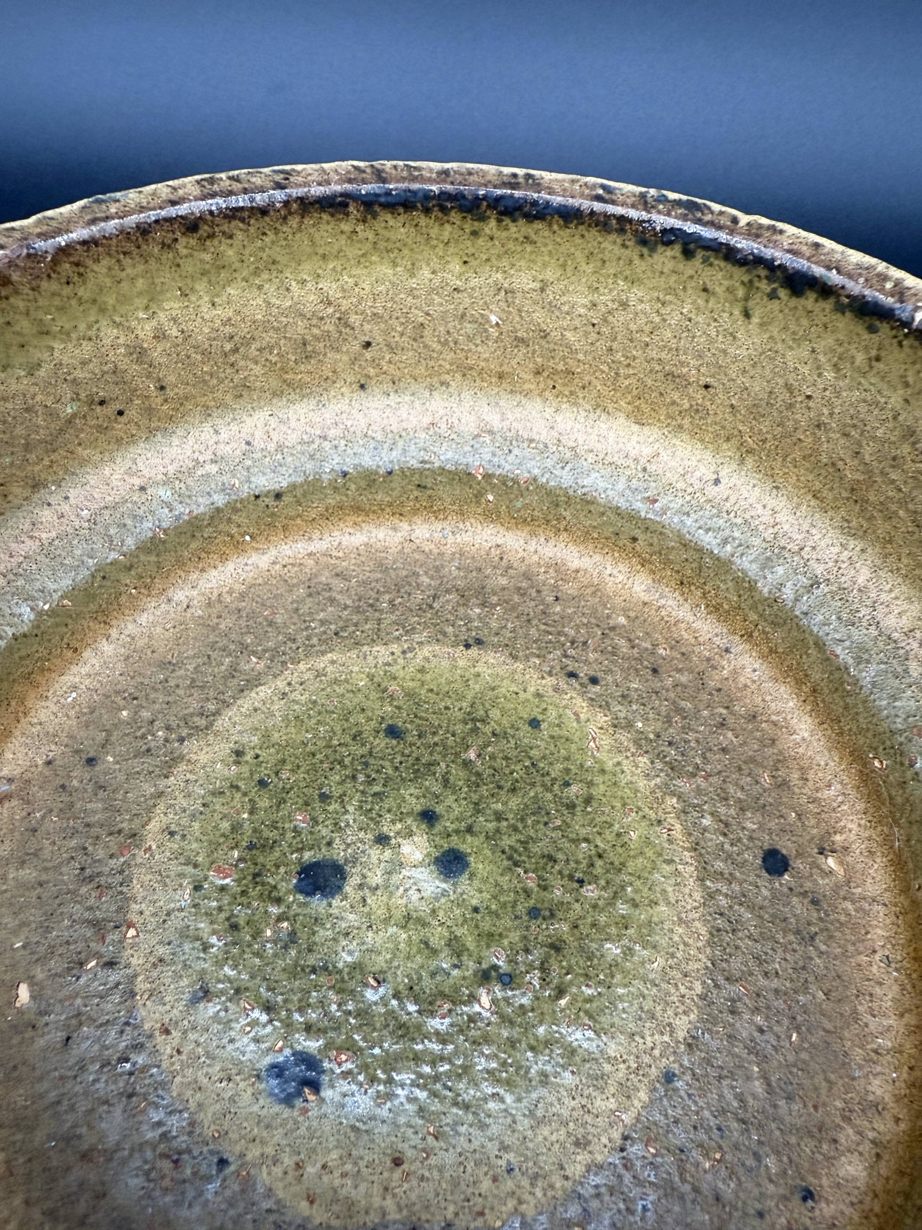 Large stoneware dish with grooved decoration, in the style of Pieter Groeneveldt
