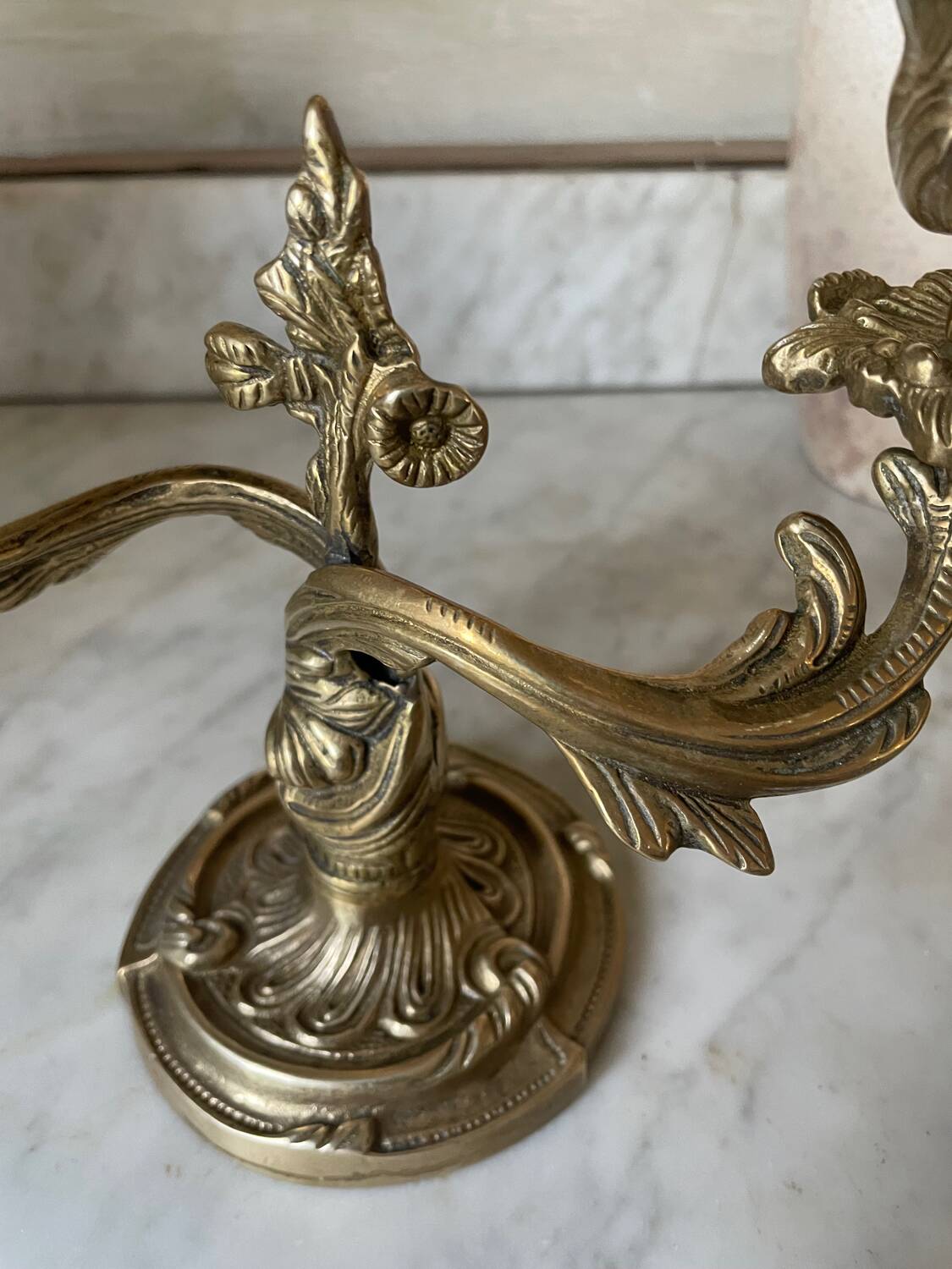 Pair of rocaille candlesticks in gilded bronze