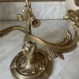 Pair of rocaille candlesticks in gilded bronze