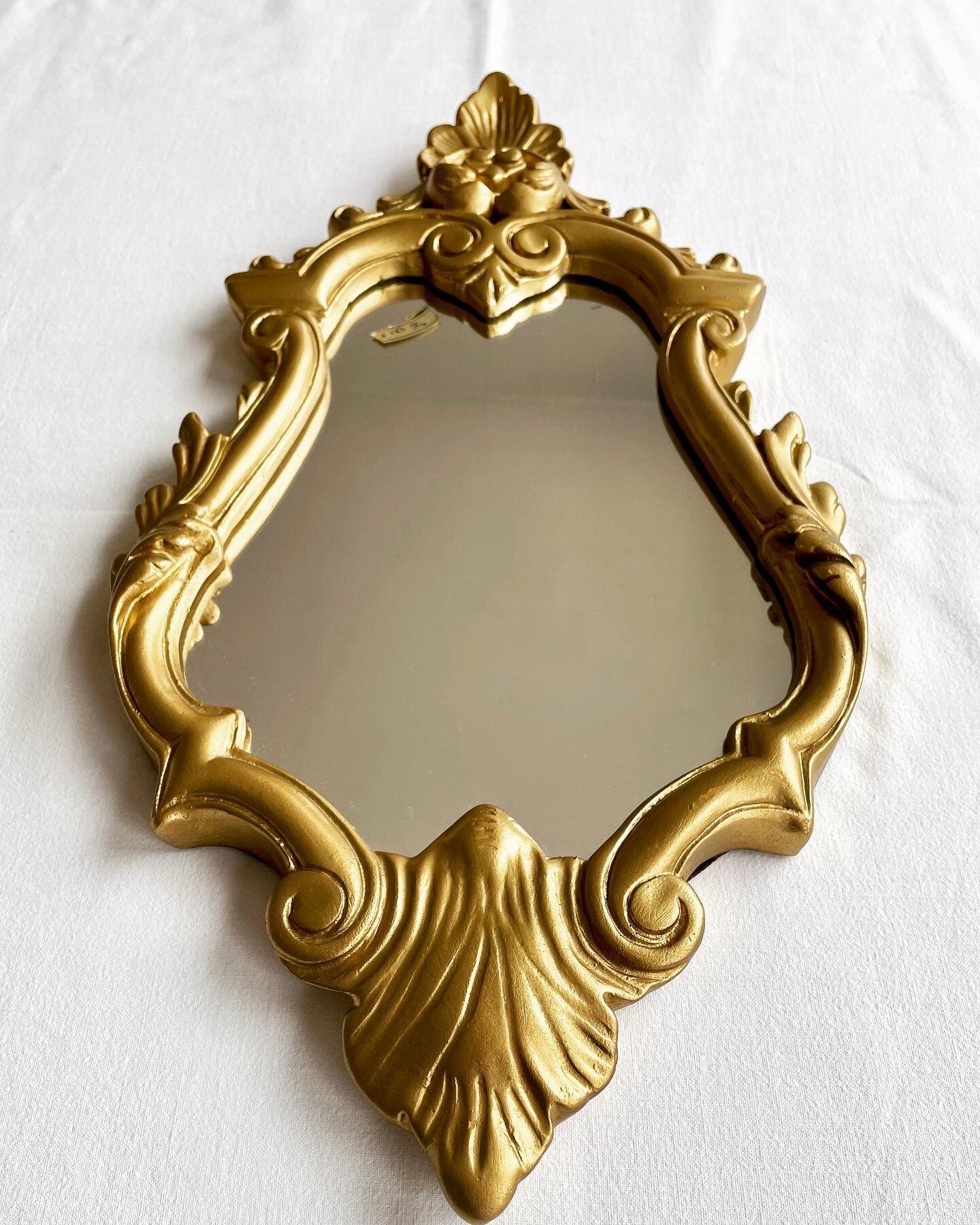 Baroque mirror in golden resin 26x49cm